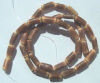 16 Inch Strand of 10x5mm Carved Sigid Tubes